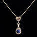 Beautiful Lapis  stone is viewed on a flute trill key.  A fleur de lis bail on a  16" silver plated snake chain.