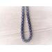 Denim blue faceted beaded necklace with silver clasp