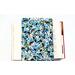 A padded book sleeve on top of an open book. The book sleeve is made with a blue floral Rifle Paper Co. cotton print called Garden party.