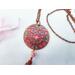 A resin stained glass pendant