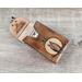 Premium Handmade Leather Tarot Card Case featuring a wise all-seeing owl patiently waiting on a branch in front of the full moon. This high quality leather case has a unique and interesting 3 color finish, with a natural tan moon set against a dark rich brown.
