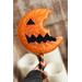 handmade horror pumpkin resin lollipop prop - costume prop and decoration orange and black front for cosplayers and Halloween collectors