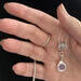 Beautiful Amethyst stone is viewed on a flute trill key.  A fleur de lis bail on a  16" silver plated snake chain.