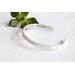 Sterling silver cuff bracelet stamped with Elle Est Forte and Prov 31:25.