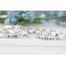 Free formed organic shaped sterling silver ring stamped with name and hearts. 