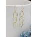 Solid 18k gold triple hoop hook earrings.