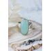 Sterling silver ring band featuring a oblong sea green/blue Chalcedony stone in a sterling silver bezel.