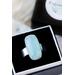 Sterling silver ring band featuring a oblong sea green/blue Chalcedony stone in a sterling silver bezel.