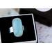 Sterling silver ring band featuring a oblong sea green/blue Chalcedony stone in a sterling silver bezel.