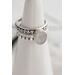 Sterling silver ring with oval faceted moonstone set in a bezel setting with two separate complimentary silver patterned ring band to stack.