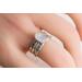Sterling silver ring with oval faceted moonstone set in a bezel setting with two separate complimentary silver patterned ring band to stack.