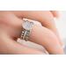 Sterling silver ring with oval faceted moonstone set in a bezel setting with two separate complimentary silver patterned ring band to stack.