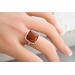 Square Baltic amber cabochon set on a textured organic sterling silver band and bezel.
