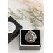 Sterling silver wide band ring will floral design, a morinci 2 turquoise pear shaped cabochon with pyrite inclusions and beaded accent bezel