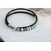 Triple wrap leather cord bracelet made with aqua blue amazonite beads sterling silver accents, and a handcrafted sterling silver hook clasp.