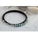 Triple wrap leather cord bracelet made with aqua blue amazonite beads sterling silver accents, and a handcrafted sterling silver hook clasp.
