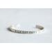 Sterling silver cuff bracelet stamped with Elle Est Forte.