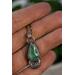  Sterling silver drop necklace with fox turquoise and a floral moon accent. Charm hangs on a sterling silver oxidized square bead chain.