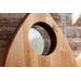 a close-up view wooden planchette charcuterie or cutting board made of butcher block for kitchen decor with acrylic looking glass