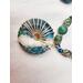 Wire wrapped green jade donut pendant