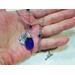 Image is of a Blue Crystal Teardrop Pendant with a Silver Hama Hand charm wire wrapped on a chain. 25" long