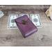 Handmade Premium Leather Tarot Card Case in a purple hue called Violet Cosmos. Shown laying flat with standard size tarot cards.