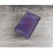 Handmade Premium Leather Tarot Card Case in a purple hue called Violet Cosmos with black hand stitching.