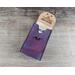 Handmade Premium Leather Tarot Card Case in a purple hue called Violet Cosmos with black hand stitching.
