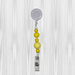 yellow beaded badge reel