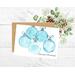 Card with light blue watercolor ornaments. There are five round globes.  With or without wording Seasons Greetings.