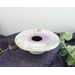 photo of kiln-fired copper enamel ikebana-style vase with hand painted hibiscus on top with is 4 inches in diameter. Enamel colors of hibiscus are pale pink and lavender, with pale green leaves. Vase stands 1-1/4 inch tall. There is a pin-frog inside to hold flowers upright.