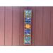 7.5 x 37 inch mosaic Totum. Bright colors with a big yellow sunburst in the center. Seagulls flying, starfish and waves. One of a kind Art.