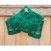 Another pic of a green scarf with trees along its length.