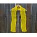 Another pic of a yellow scarf with a zig zag pattern.