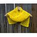 Another pic of a yellow scarf with a zig zag pattern.