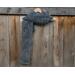 A grey vine crochet scarf display.