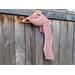 Another pic of a pink scarf with a zig zag pattern.