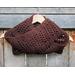 Another pic of a brown scarf with a zig zag pattern.