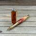 Pink wood rollerball pen