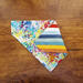 Over the collar reversible dog bandana paint splashes on one side stripes on the other