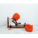 Image of a yarn winder showing one of the steps it takes to make a dog scarf that is designed for sight hounds.