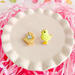 fireflyFrippery Yellow Chick Sugar Cookie Earrings on Pink Display - Front & Back