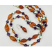 Double-strand necklace — graduated strand of Czech 1920s amber glass ovals, amethyst, and Burma jade