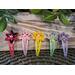 2 inch long handmade crochet flower barrettes with 6 millimeter rhinestone in 5 colors