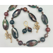 Necklace set | Small bronze scarab bead, large faceted multi-colored agate ovals and rounds