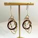 Madera Design Studio's Circles Earrings are a pair of unique, bold, dangle hoop earrings. Handmade in Philadelphia by a small local studio. 