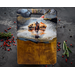 Handcrafted Western charcuterie board made from salvaged teak with original resin artwork of a cowboy riding a horse through a stream.