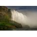 Niagara Falls from the base of the falls. showing the powerful water coming over the cliff above.