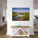 Oxbow Bend in Grand Teton National Park. Mount Moran rising above the snake river, showing a beautiful reflection in the water, with wildflowers in the foreground
room mockup shown
