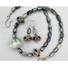 Necklace set | Carved focal stone, pearly gray vintage glass beads, sterling silver rondelles, "flying saucer" Bali silver